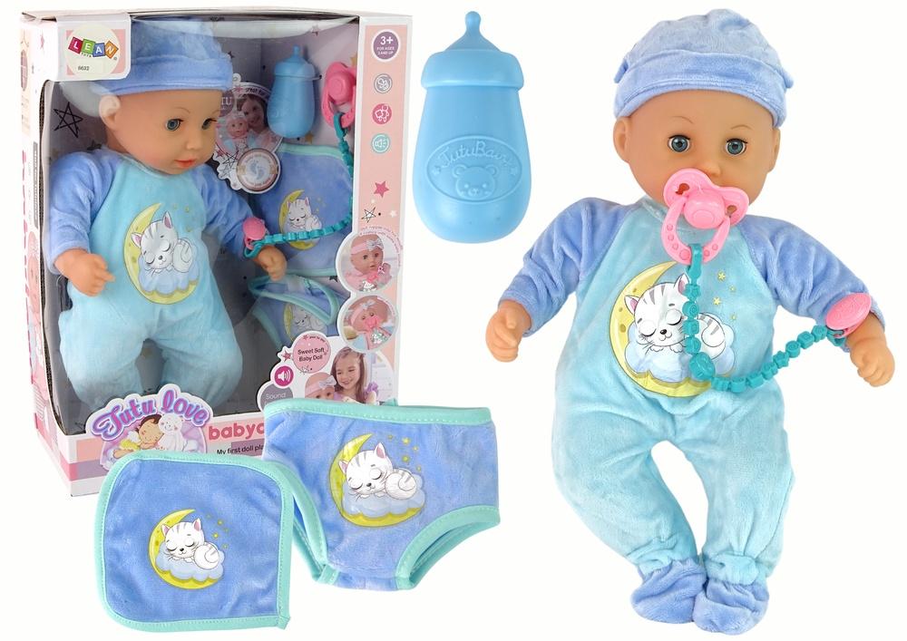 Bedårande babydocka med ljud, dummy, haklapp och kattpyjamas