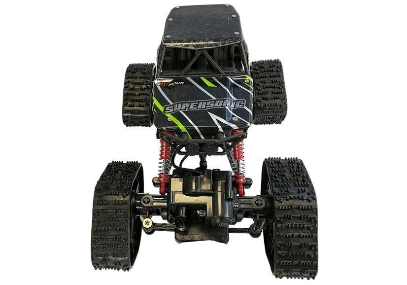 Grön 4x4 terräng R/C-bil med dubbla däck och stötdämpare