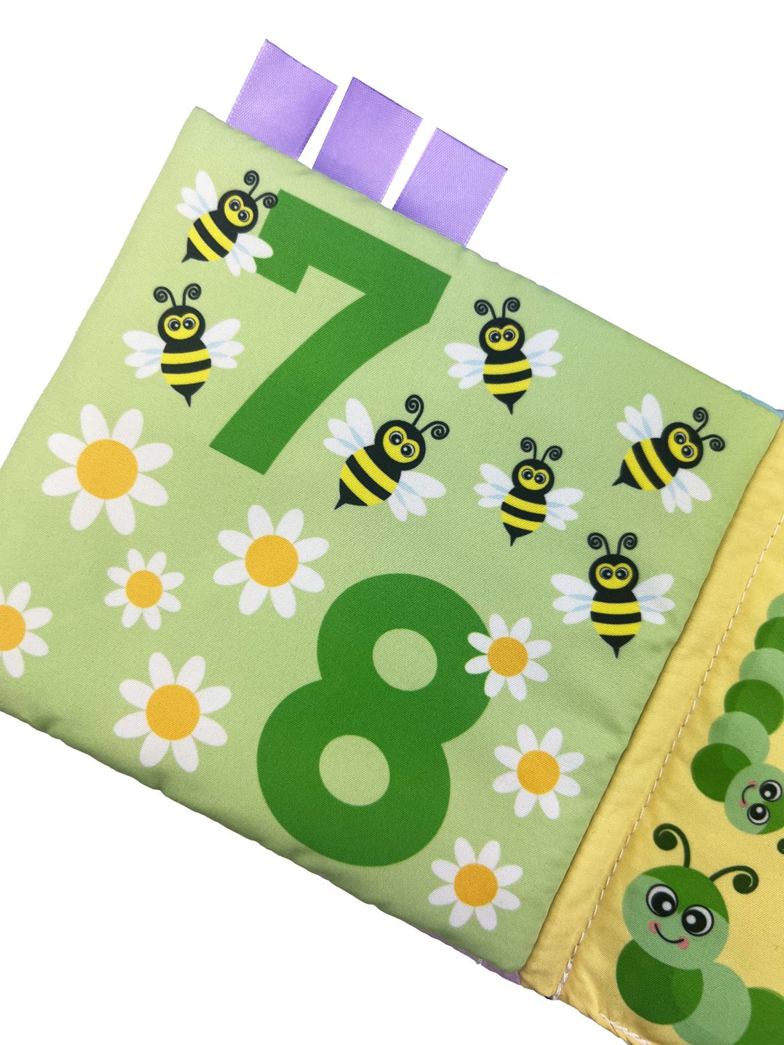 Mjuk babybok med ljusa färger och djurbilder